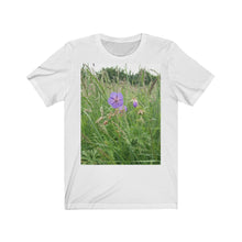 Load image into Gallery viewer, Photograph of a meadow cranesbill flower printed onto a white T-Shirt.